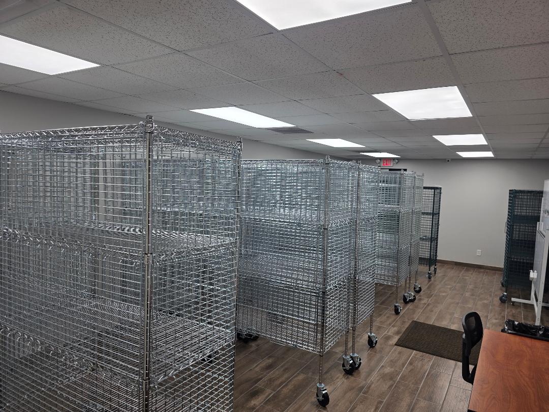 Secured dry storage bays for members